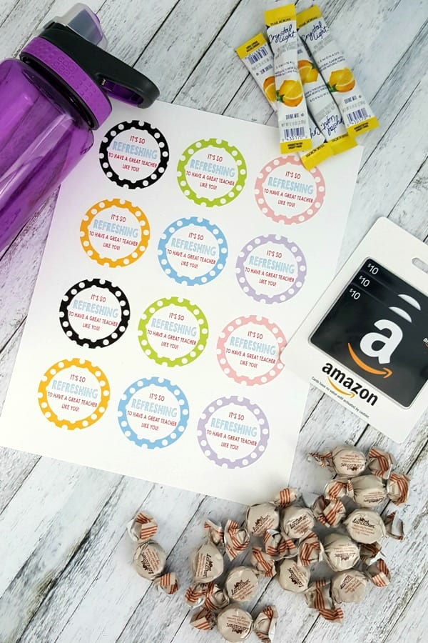 An image of free back to school printables, a water bottle, candies and Amazon gift cards 