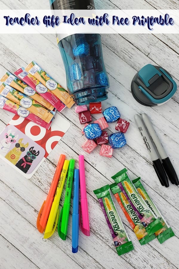 An image of free back to school printables, a water bottle, candies, highlighters and Target gift cards 