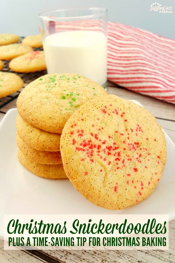 A plate with a pile of Christmas snickerdoodles and a glass of milk.
