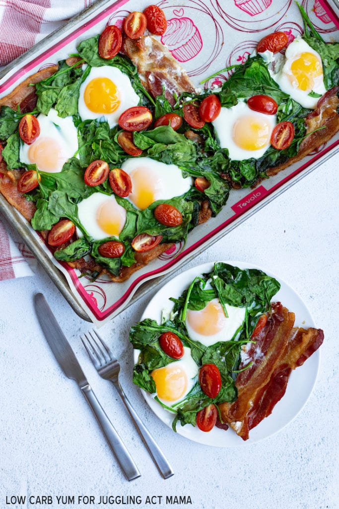 Sheet Pan Eggs and Bacon with tomatoes and spinach.
