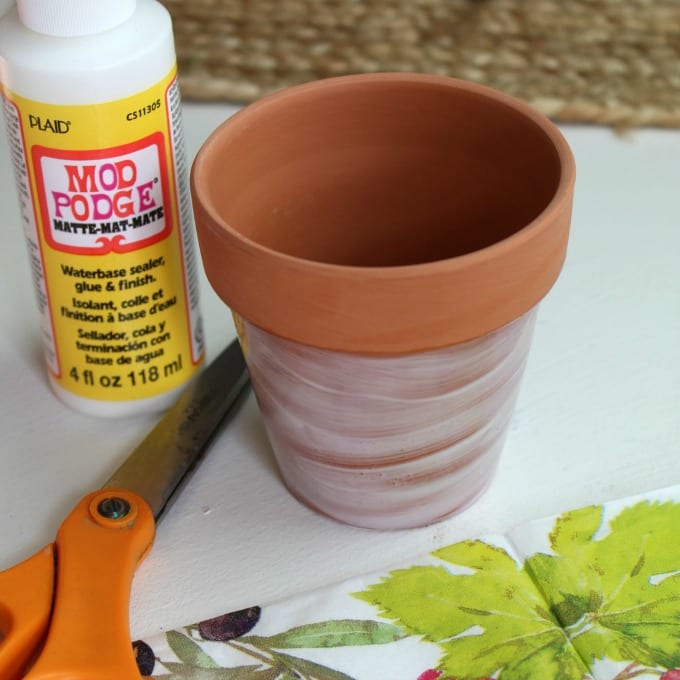 terra cotta pot painted with mod podge
