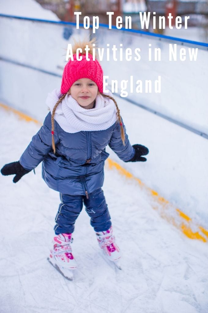 a little girl with a smile on her face as she enjoys ice skating 