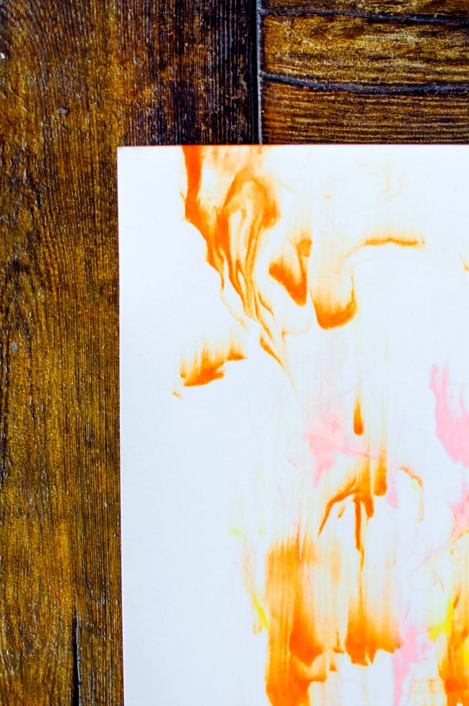 Shaving Cream Painting on a wooden table.