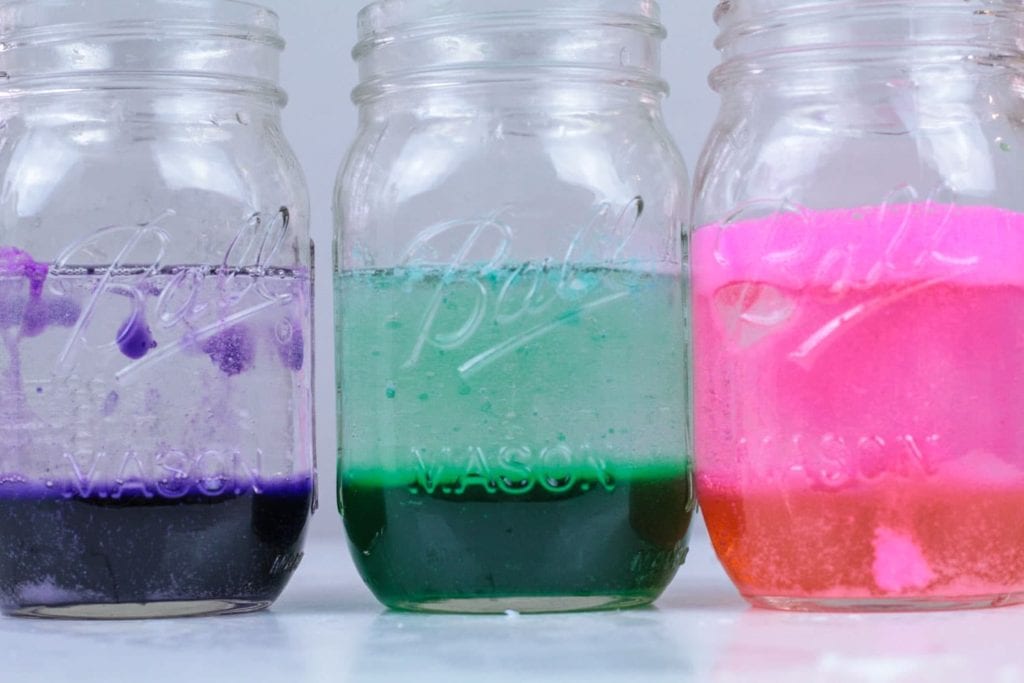 Mason jars filled with baking soda, alka seltzer and citric acid to perform the Lava Lamp Science Experiment from Steamsational.