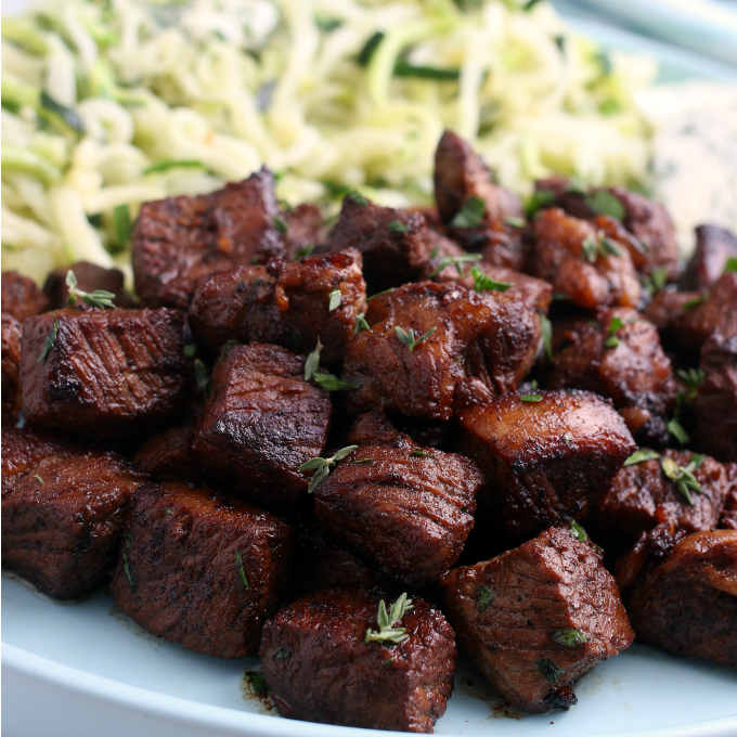 Steak bites with garlic butter.