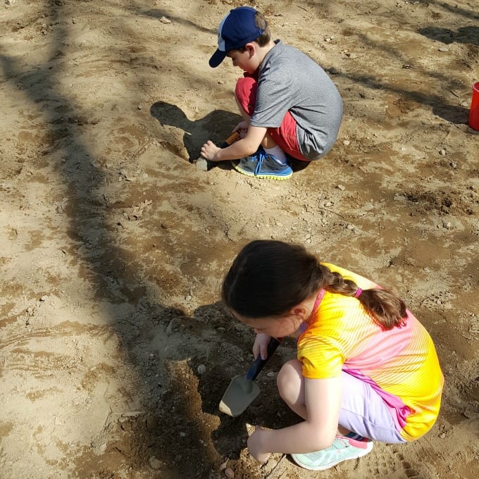 children digging at America's Stonehenge in NH