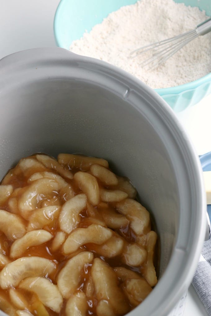 Step-by-Step image for how to make slow cooker apple cobbler.