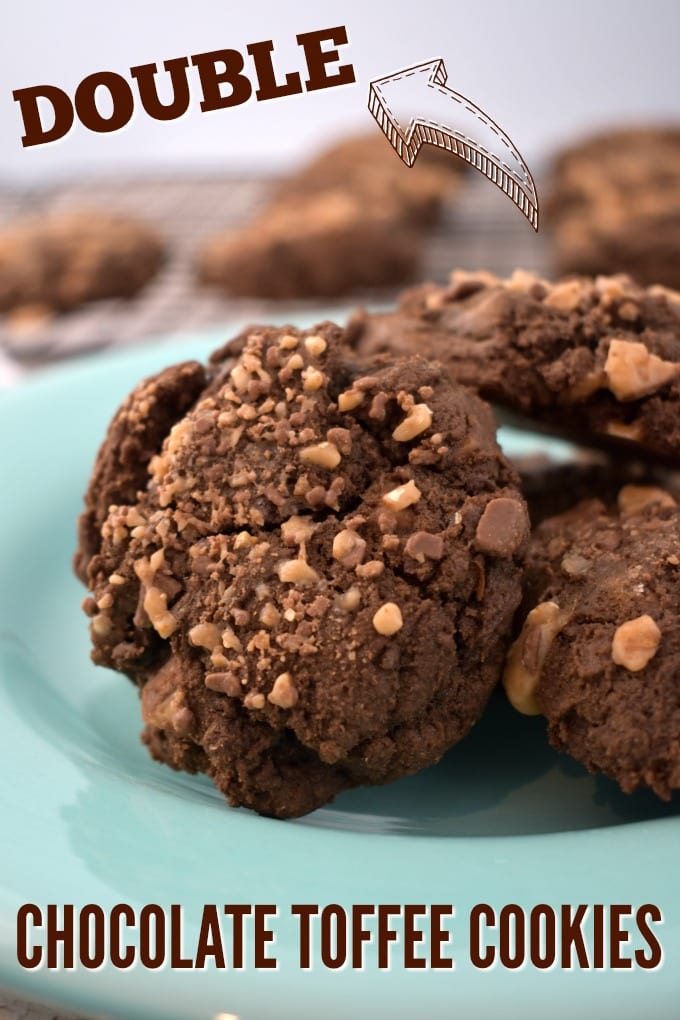 Double Chocolate Toffee Cookies piled on a light blue plate.