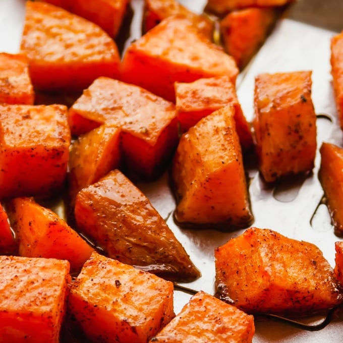 Close up of roasted sweet potatoes with cinnamon.
