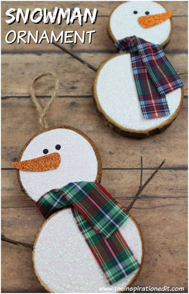 close up of wood slice snowmen ornaments