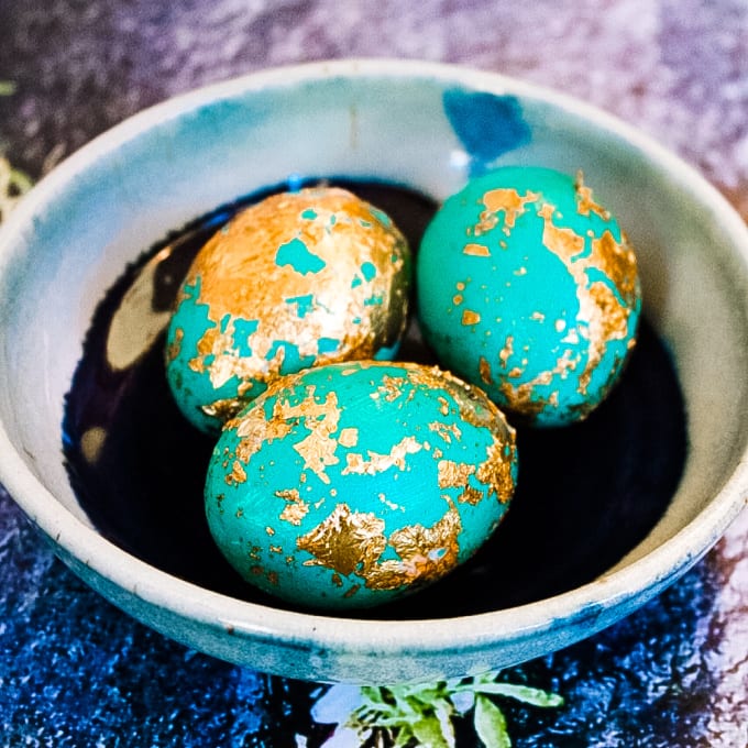 close up of DIY Gold Leaf Easter Eggs in a bowl