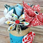 Paper flowers in a painted mason jar.