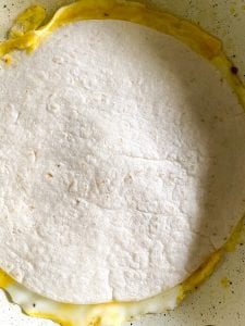 How to Make egg quesadillas: top with the flour tortilla.