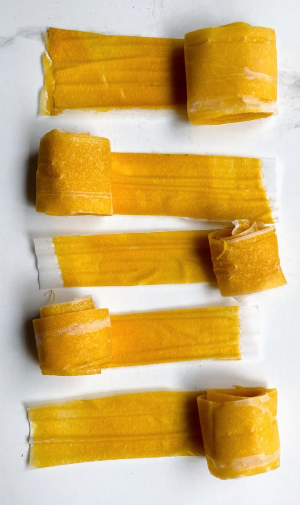 5 rolled up mango fruit leathers.
