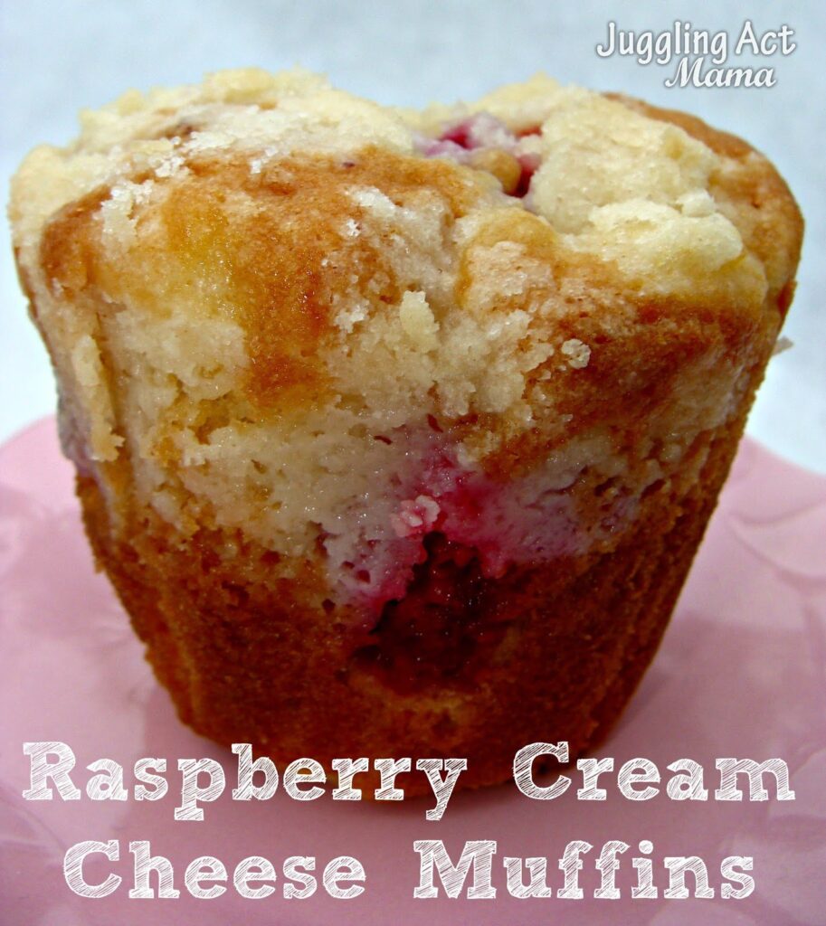 Close up image of a raspberry cream cheese muffin.