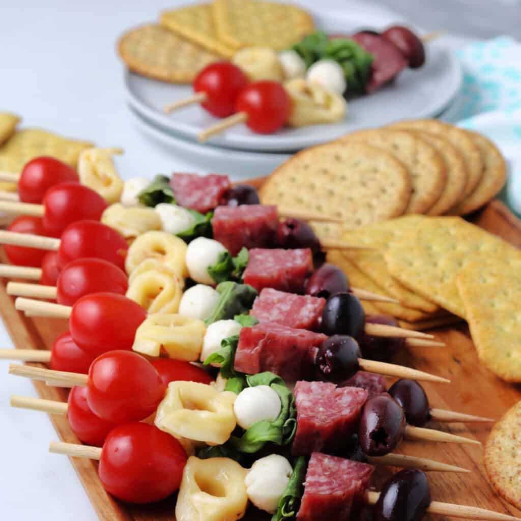 Close up image of Antipasto Kabobs on a cutting board.