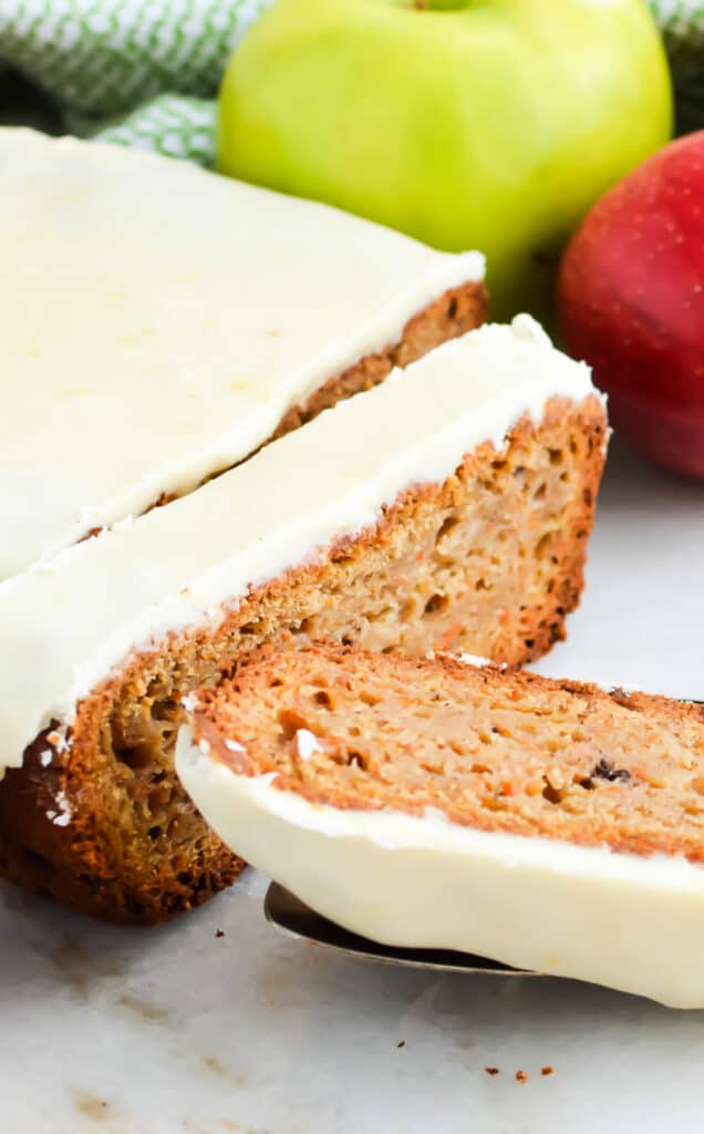 sliced of Apple Carrot Bread topped with lemon glaze