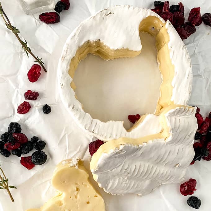 How to make baked brie with cranberry sauce for Thankgiving.