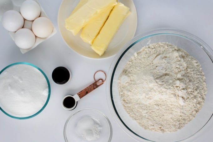 Ingredients to make ornament shaped sugar cookies.
