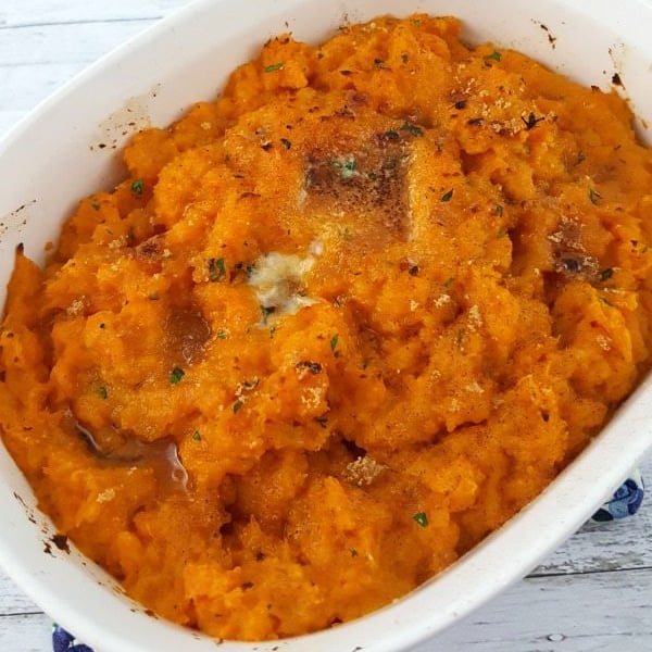 Top down image of sweet potatoes with brown sugar.