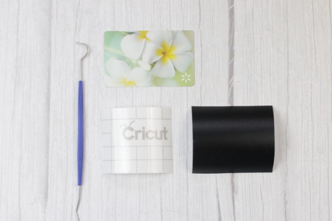 Vinyl, transfer tape, a weeding tool and a rubbing tool. 