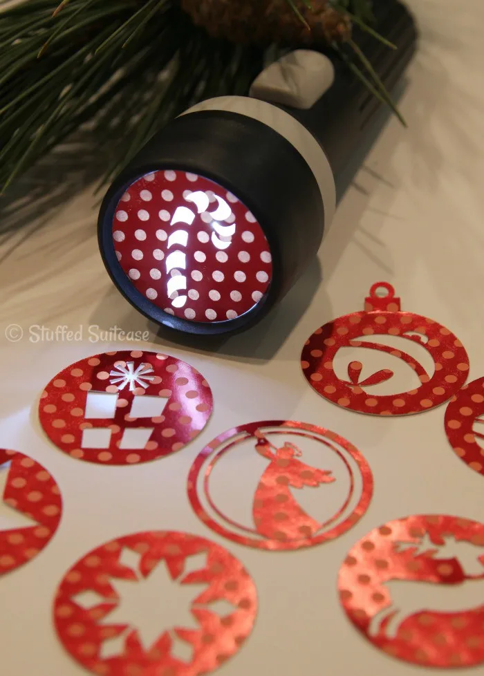 Cut out flashlight projections for Christmas.