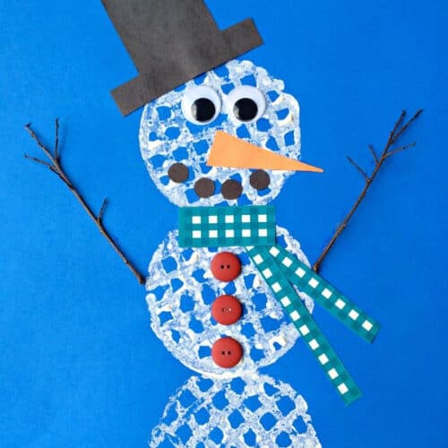 Top down view of a waffle snowman craft.