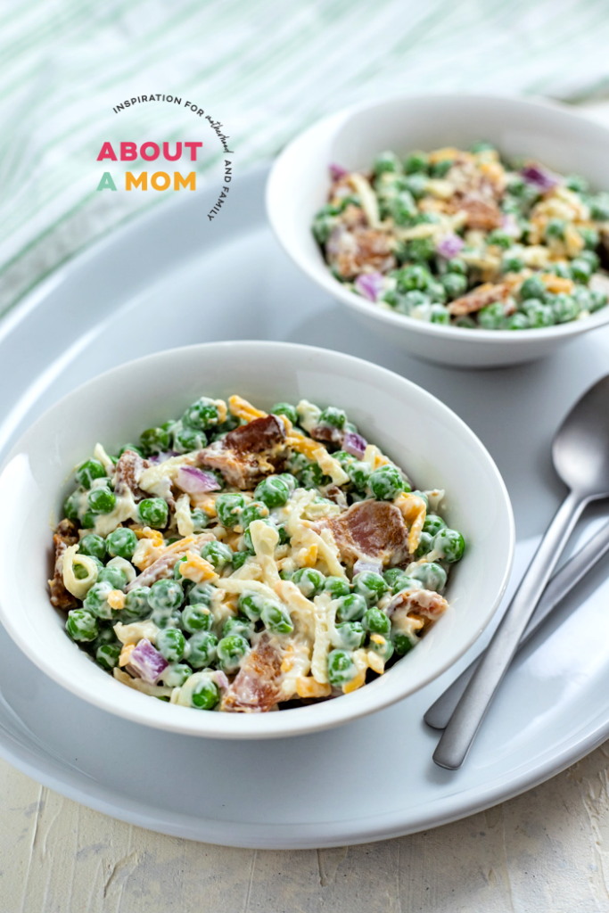 Two bowls of classic pea salad.
