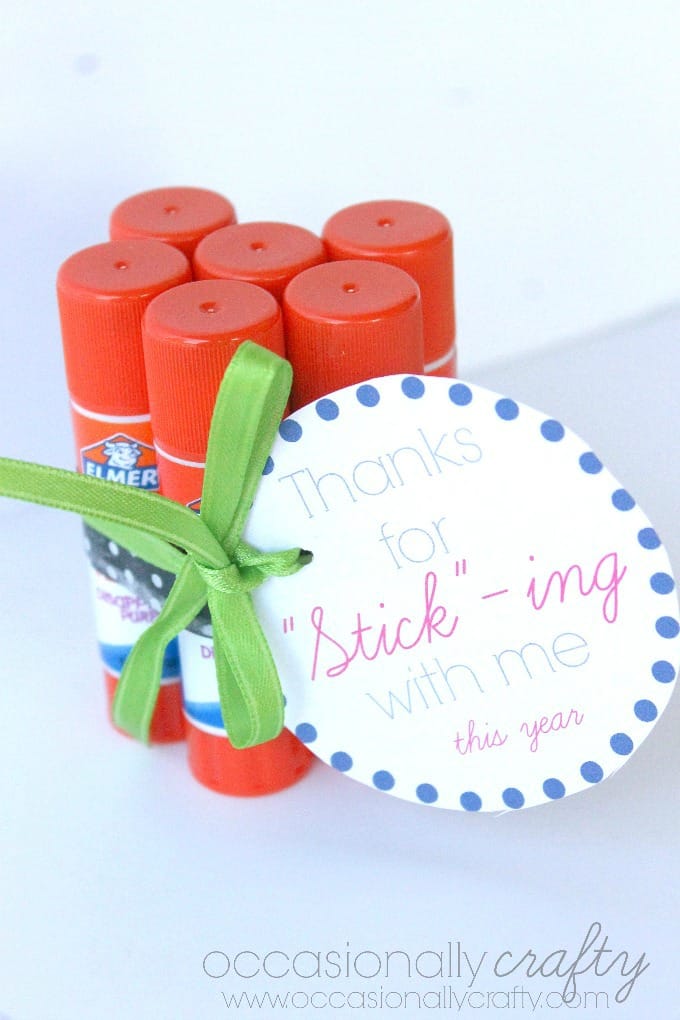 Gluesticks wrapped with a ribbons and a gift tag.