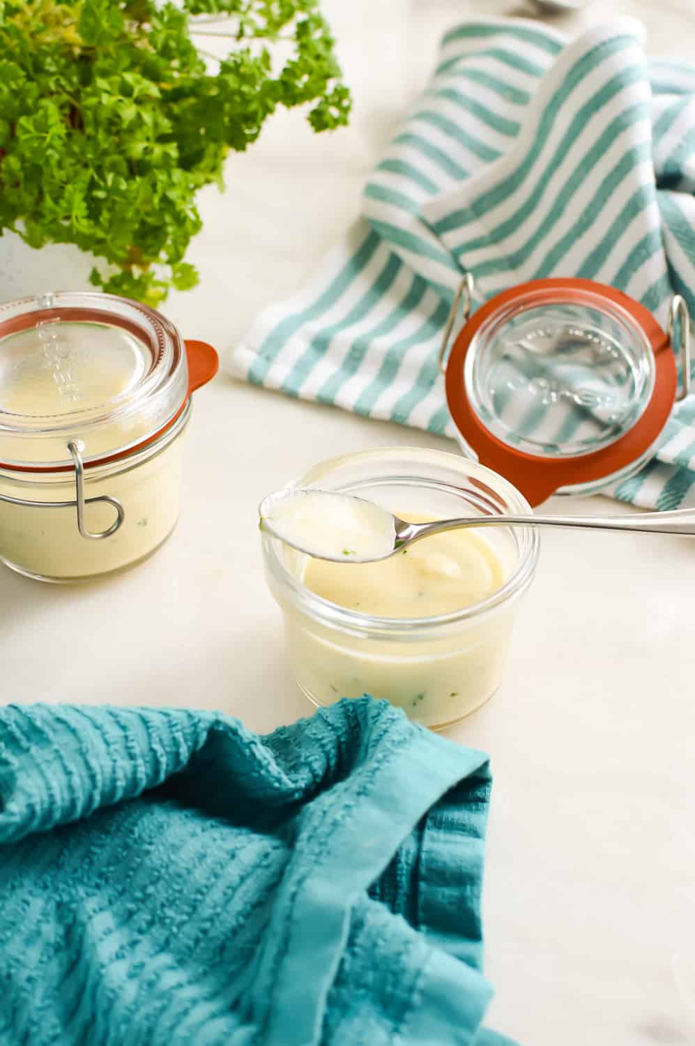 Condensed Cream Soup Base in a jar with a spoon.