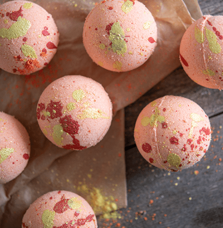 Close up of Mango Bath Bombs on a table.