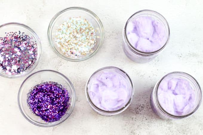 top view of light purple cotton in jars