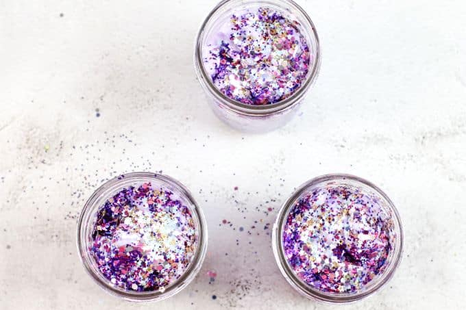 third layer of glitter added to jars