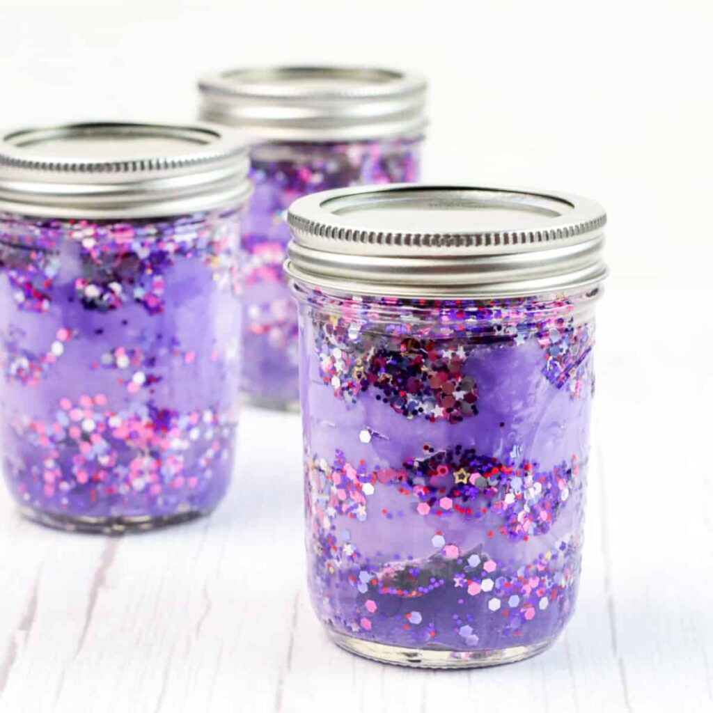 Close up of Galaxy Jars with silver lids.