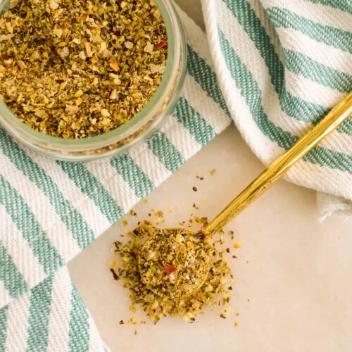 Top down view of Mediterranean Seasoning on a gold spoon.