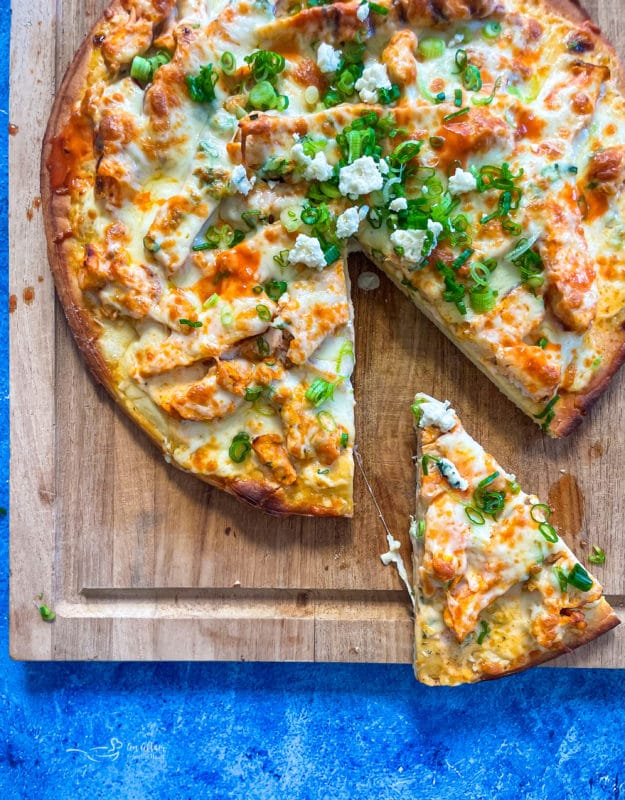 Buffalo Chicken Pizza with one slice cut from An Affair from the Heart.
