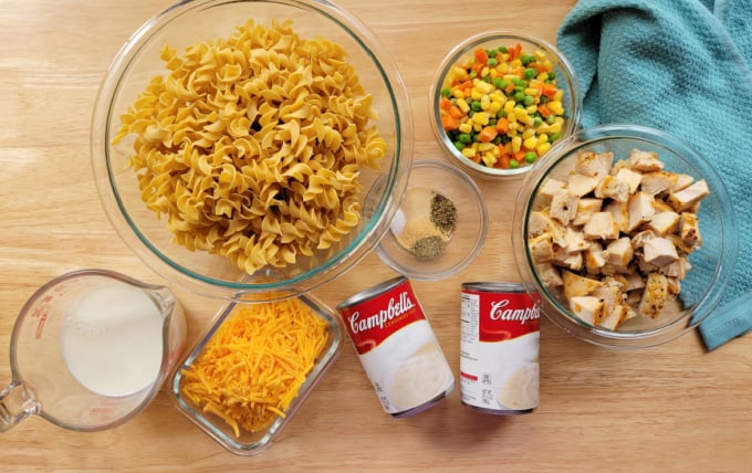Top down view of ingredients for chicken noodle casserole.