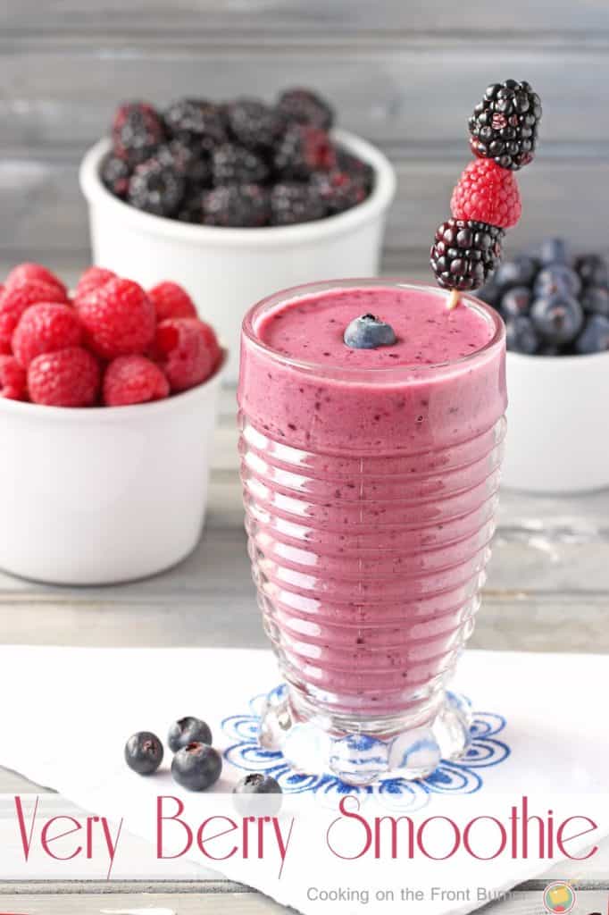Homemade Smoothies - Very Berry Smoothie from Cooking on the Front Burner - berry smoothie in the foreground with bowls of berries in the background