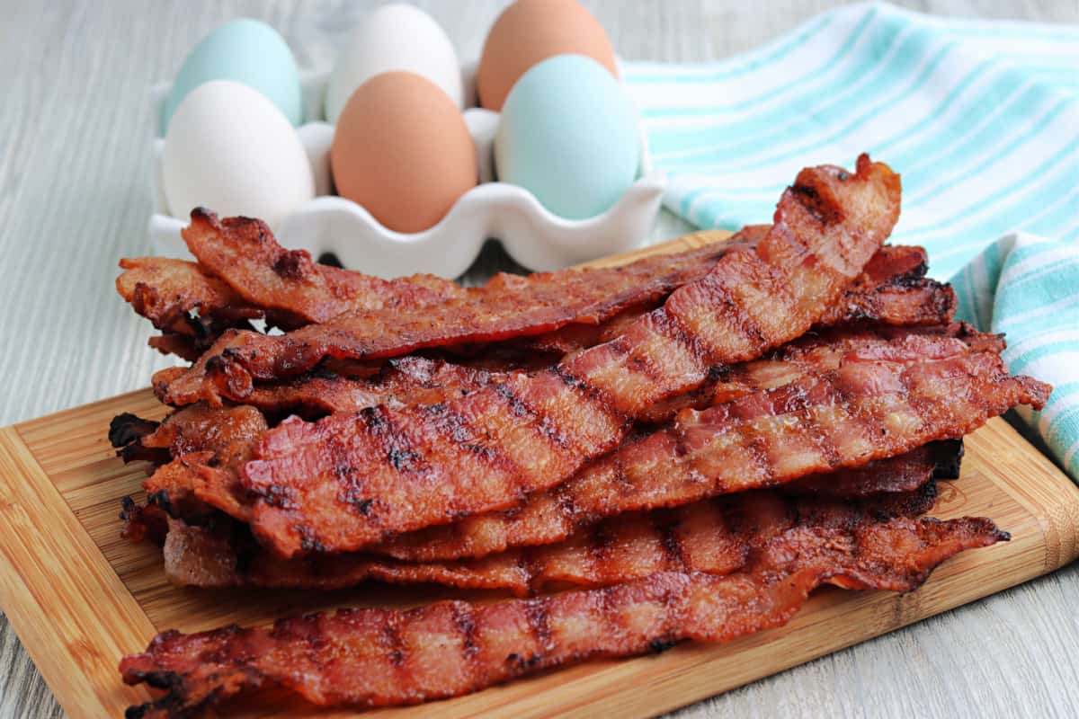 Bacon Grilled on a cutting board.