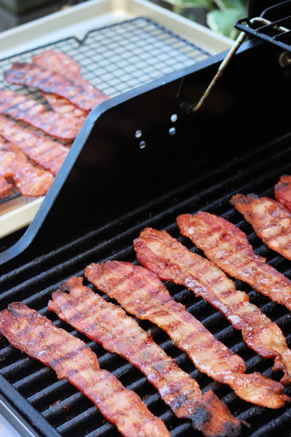 Bacon on a gas grill.