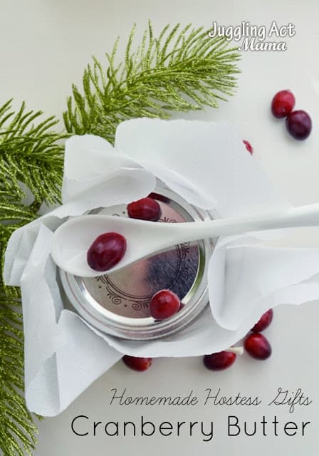 Cranberry Butter in a jar with a spoon.