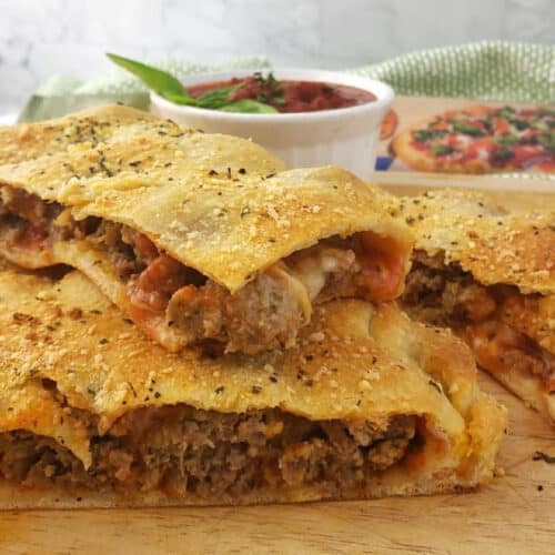 Close up of Meatball Calzone cut into pieces.