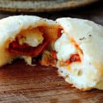 Close up of Stuffed Pizza Roll with pepperoni and cheese.
