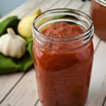 Close up of mason jar full of Homemade Tomato Sauce.