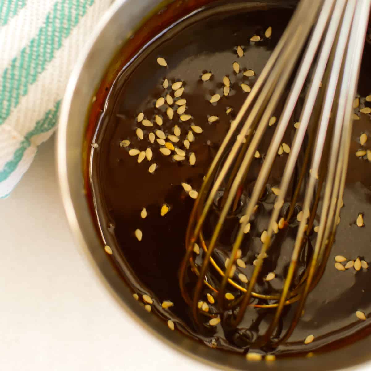 Close up showing how to make Teriyaki sauce.