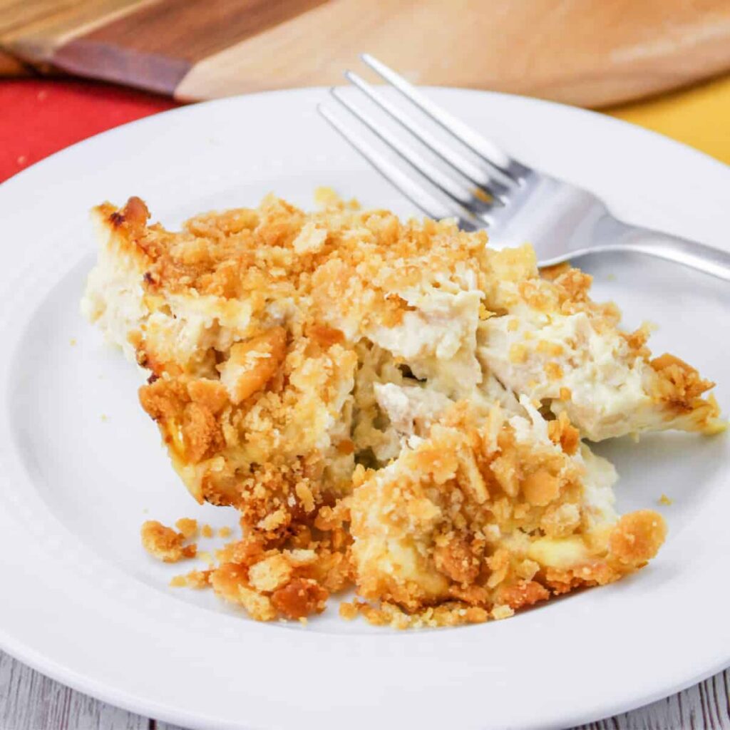 Close up of Million Dollar Casserole on a white plate.