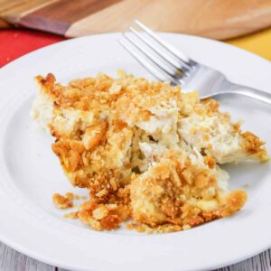 Close up of Million Dollar Casserole on a white plate.