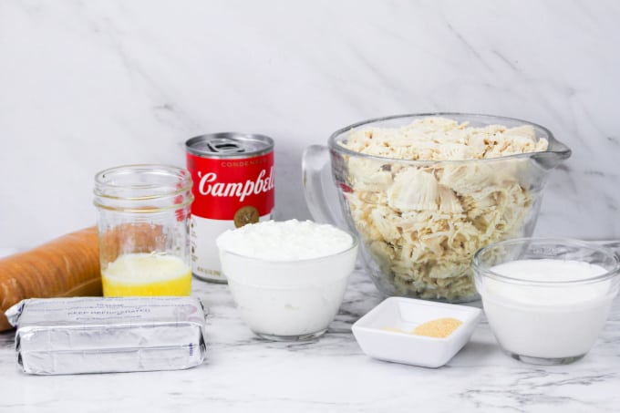 Million Dollar Chicken Casserole Recipe Ingredients on a countertop.