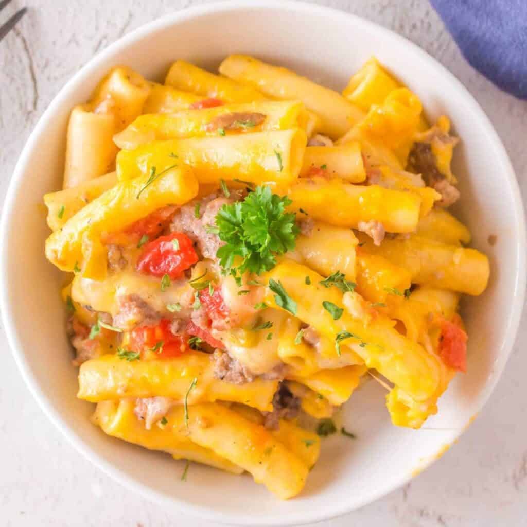 Top down view of Baked Ziti with Sausage in a bowl.