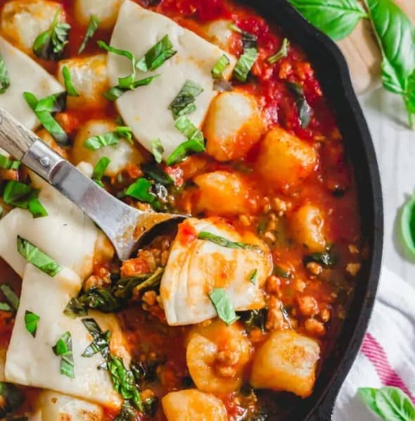 Close up of Baked Cauliflower Gnocci in a skillet.
